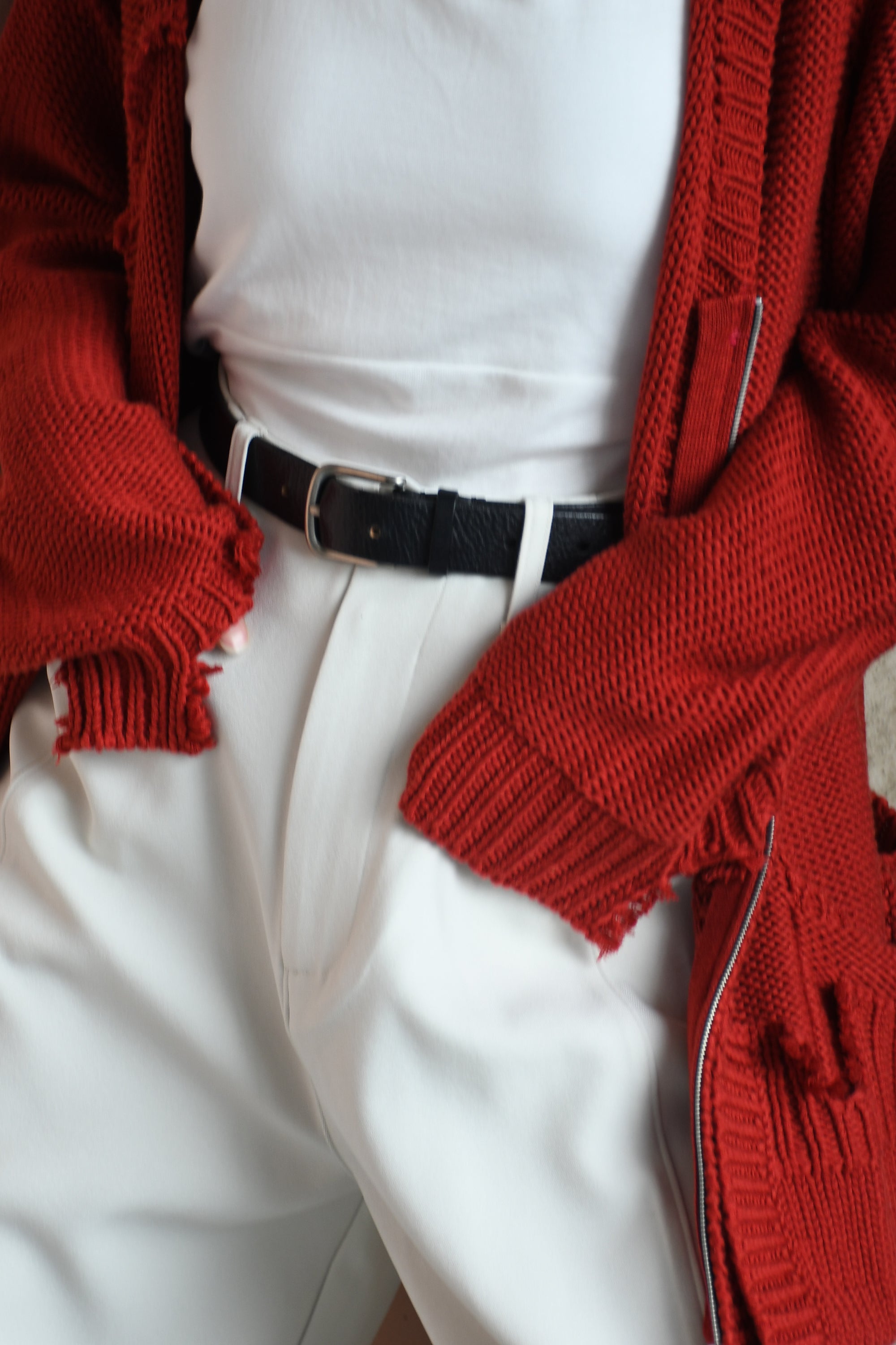 loose damaged cardigan