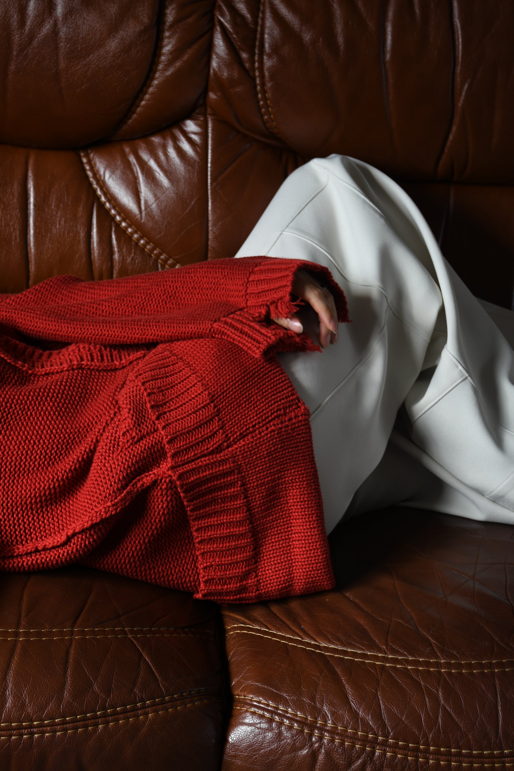 loose damaged cardigan