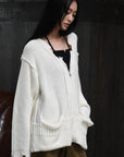 loose damaged cardigan