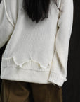 loose damaged cardigan