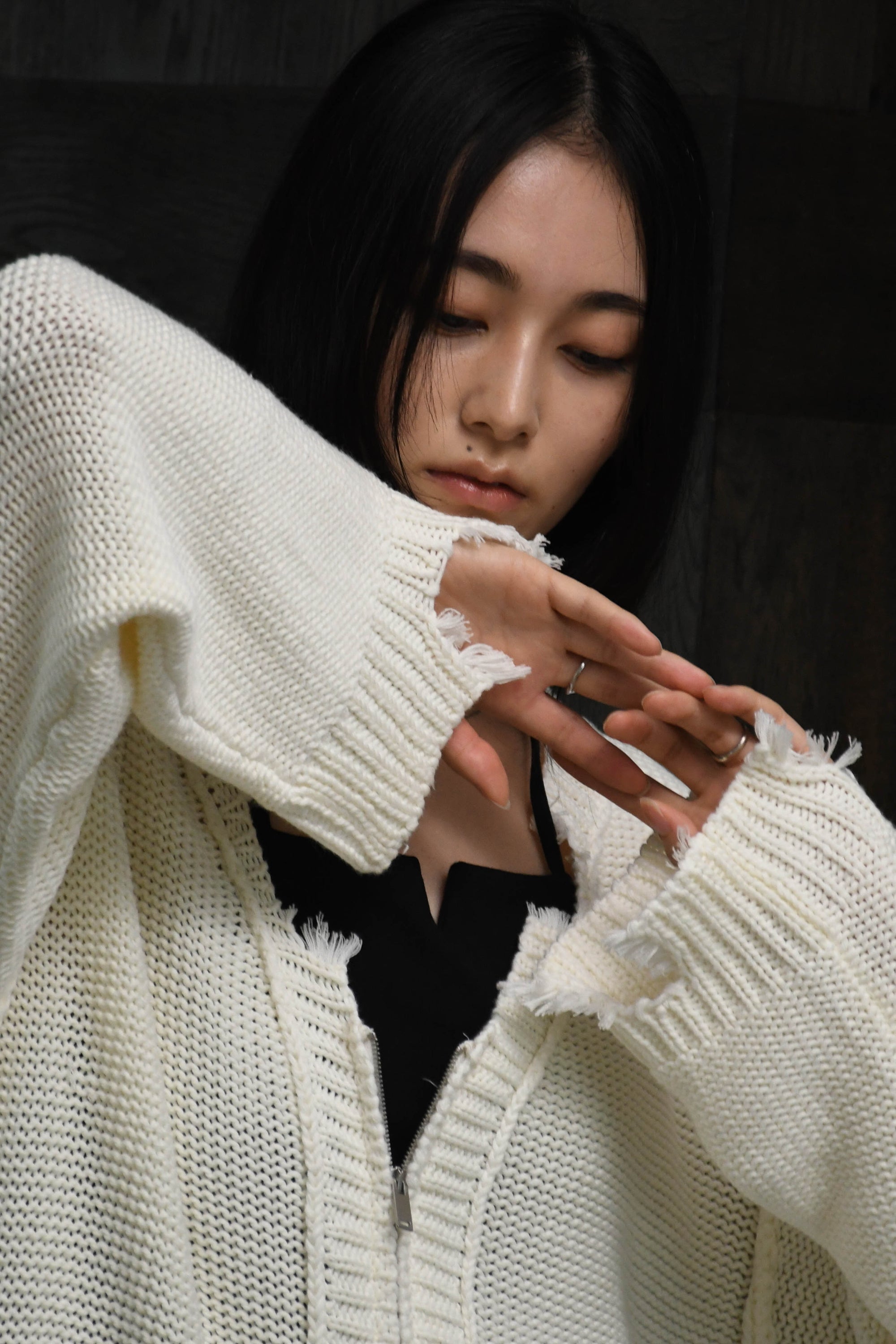 loose damaged cardigan