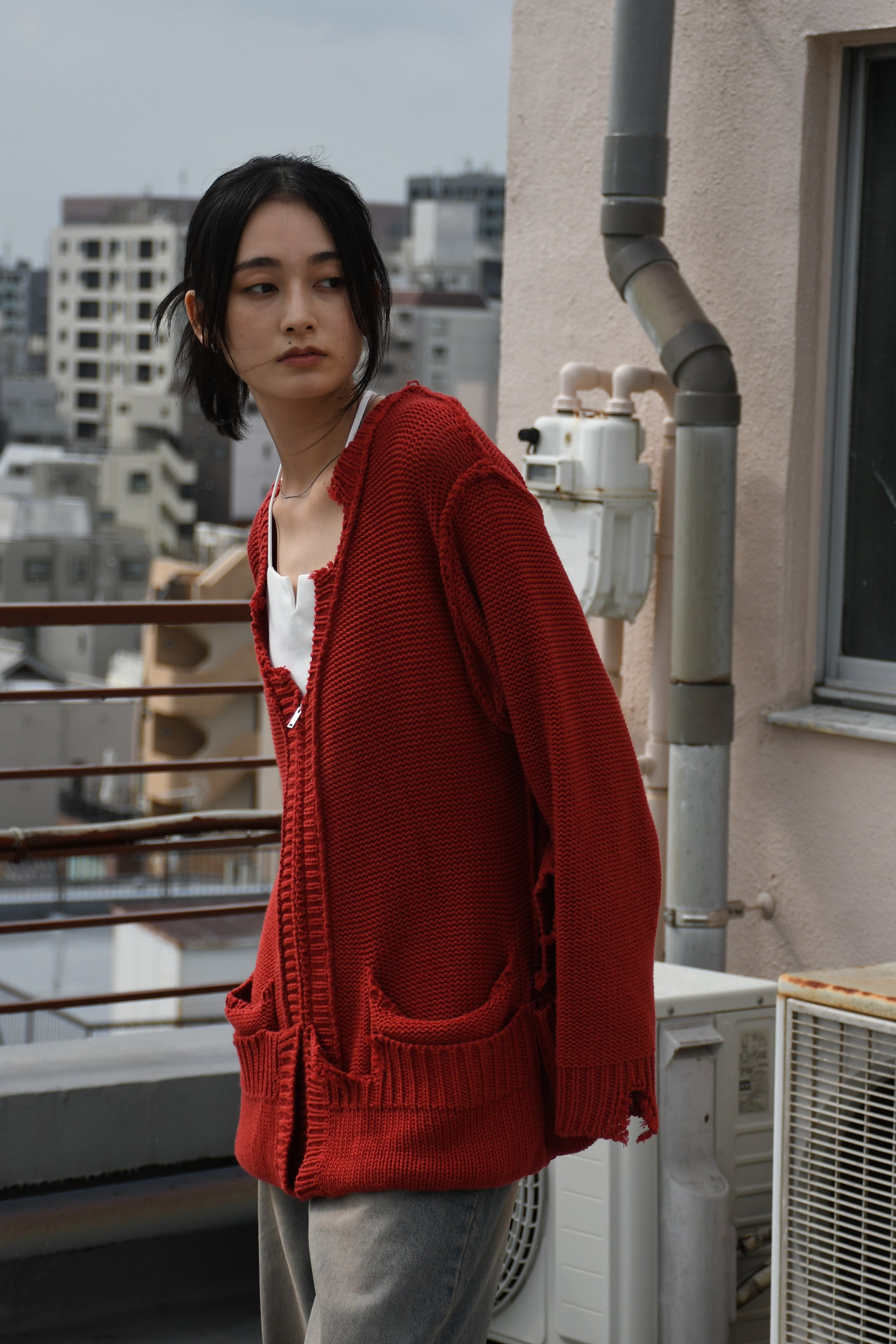 loose damaged cardigan