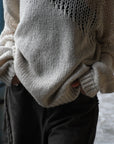 sheer asymmetry knit